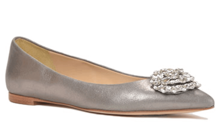 A metallic flat with a design element on the toe qualifies as a dressy flat. Image: Zappos