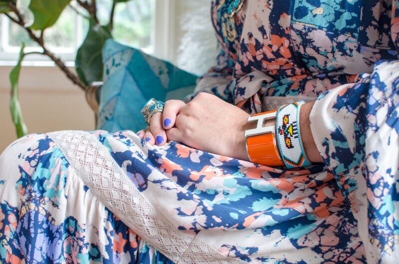 Holly of The English Room wearing hermes bracelet and beaded bracelet,  turquoise ring and blue polish