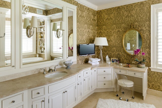 Damask wallpaper by Zoffany adds glamour to the master bath.