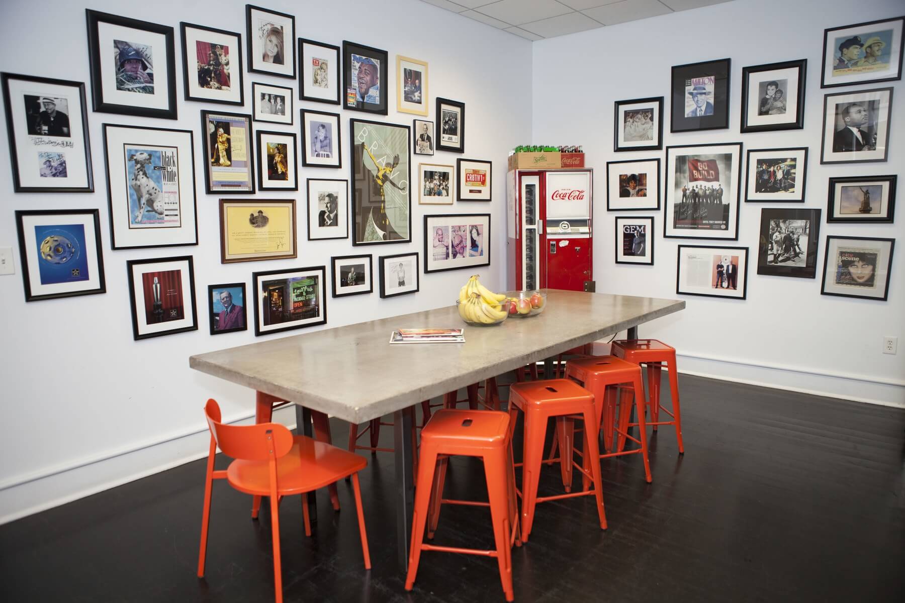 Pops of color ad art and vintage items soften the sleek black-and-white foundation