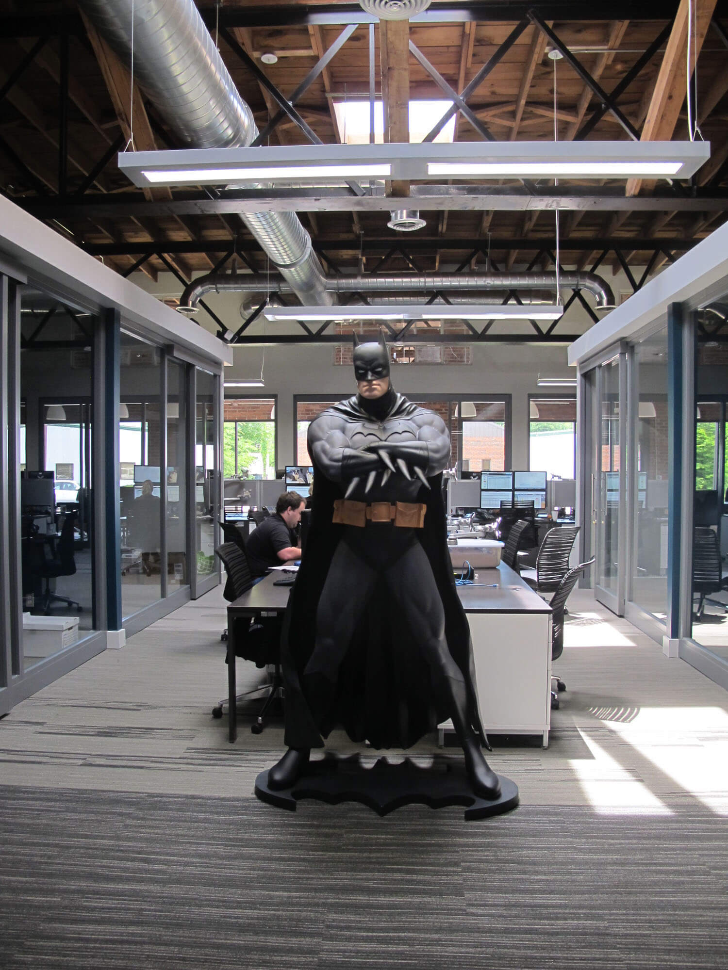 Batman lords over this common work space