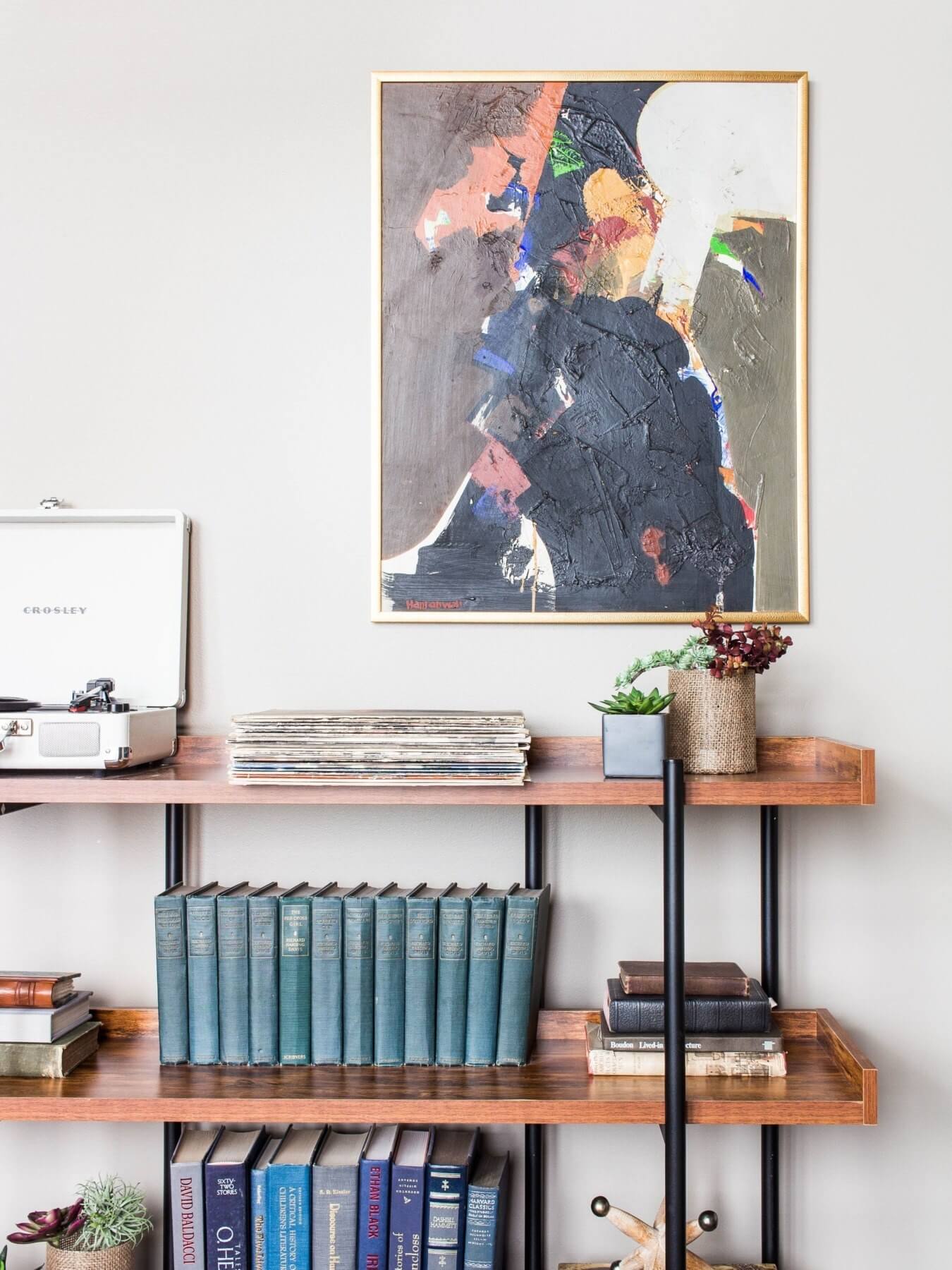 Design vignette from Marcelle Guilbeau, featuring records, books, succulents and colorful art
