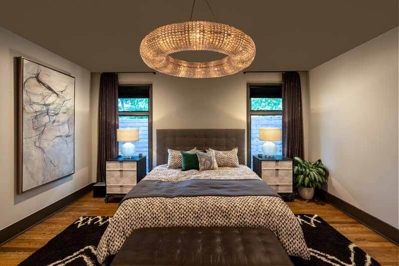 The master bedroom, with a massive lighting fixture