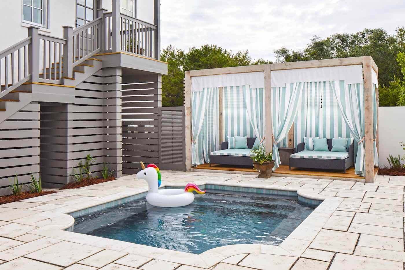 Backyard pool with unicorn floatie