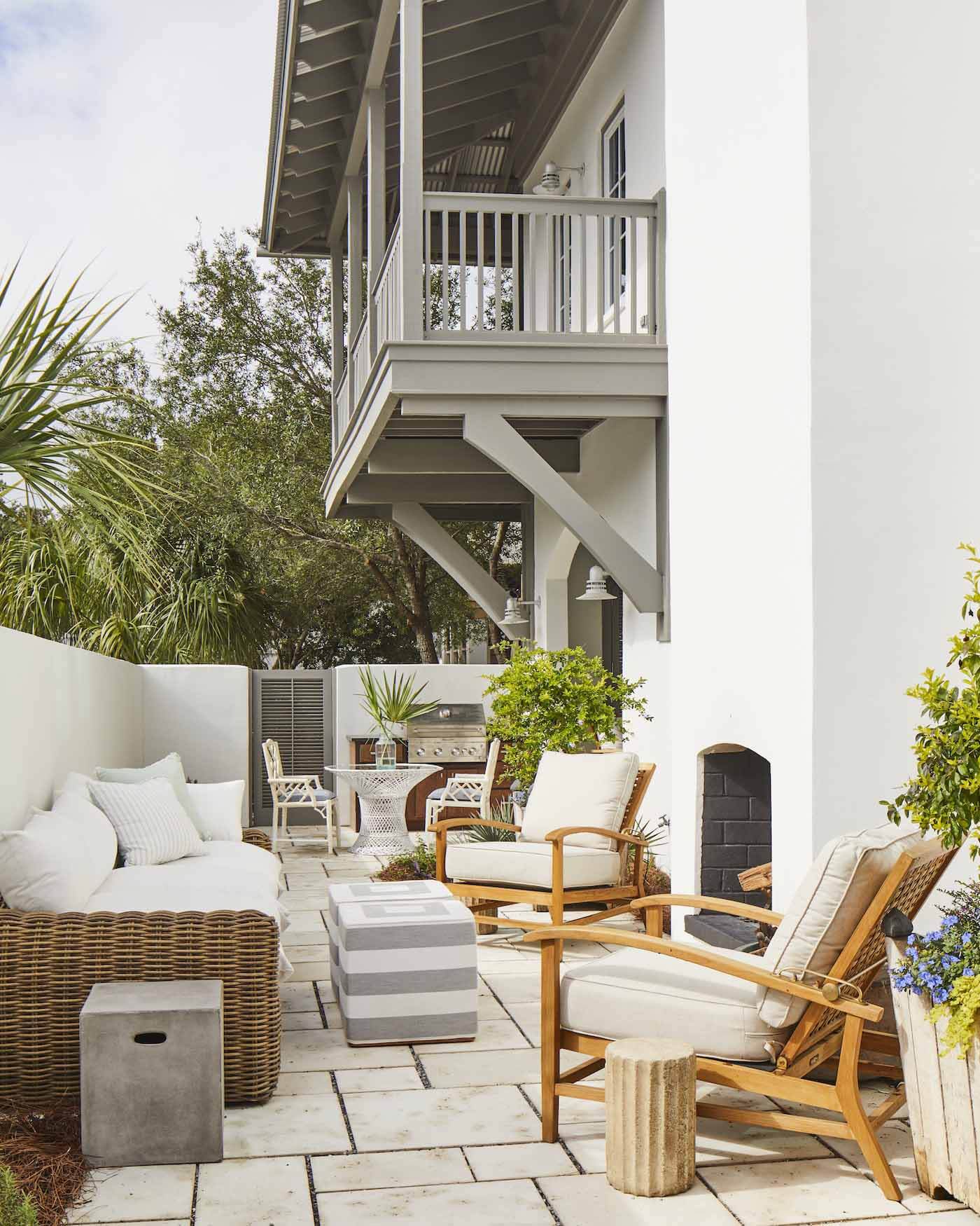 Backyard space with fireplace in Ashley Gilbreath's Rosemary Beach house