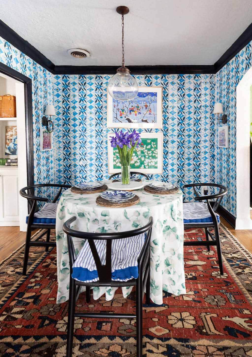 Dining room with blue block print wallpaper